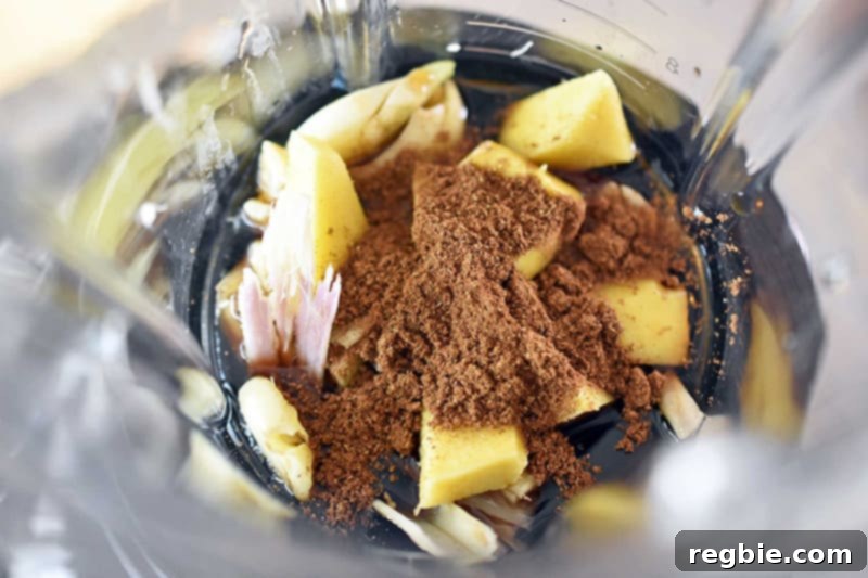 All ingredients for the lemongrass and coconut chicken marinade ready in a blender before mixing.