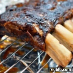 Slow roasted beef back ribs on top of a pan.