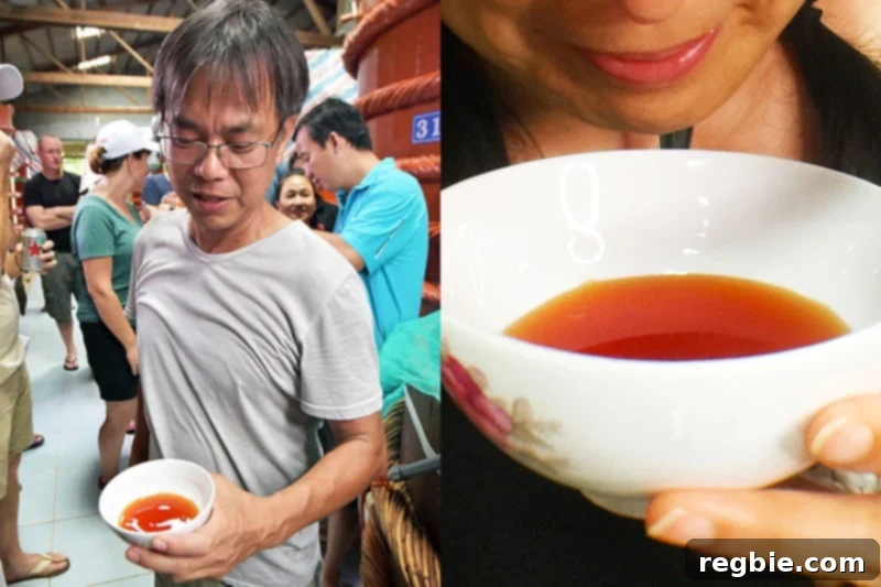 Tasting Red Boat Fish Sauce directly from the fermentation barrels.