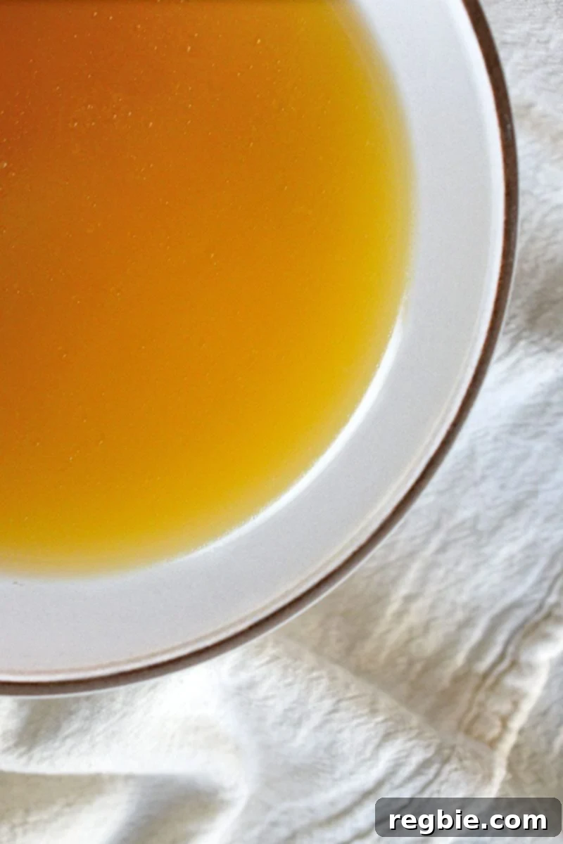 Nourishing Instant Pot Bone Broth 2 A steaming bowl of Instant Pot Bone Broth, ready to warm you from the inside out.