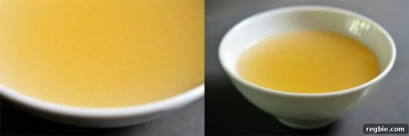 Nourishing Instant Pot Bone Broth 8 Closeup shot of a bowl of Instant Pot Bone Broth, showing its appealing texture and color.