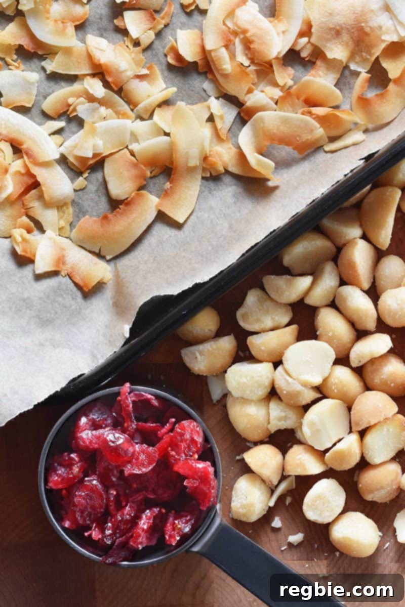 Coco-Nutty Dark Bark by Michelle Tam / Nom Nom Paleo https://nomnompaleo.com displaying all the prepared toppings.