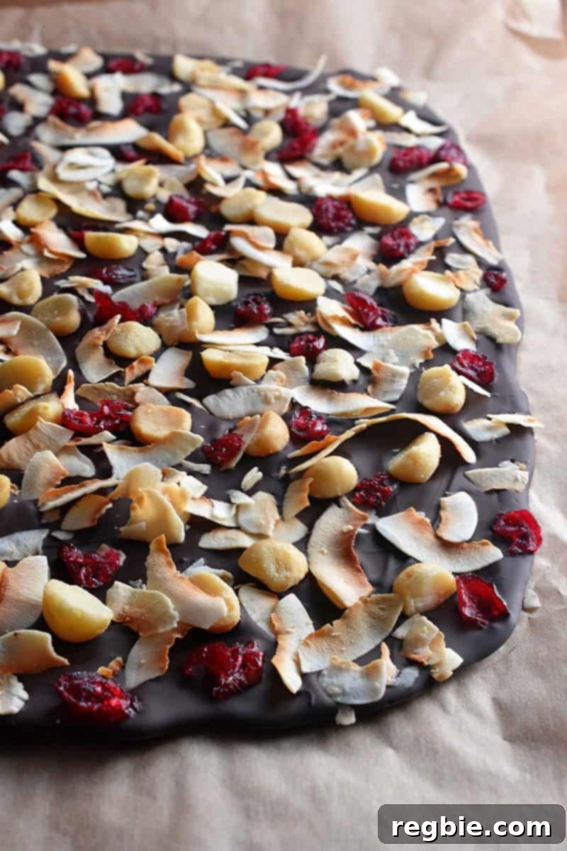 Coco-Nutty Dark Bark by Michelle Tam / Nom Nom Paleo https://nomnompaleo.com showing chocolate bark chilling in the fridge.