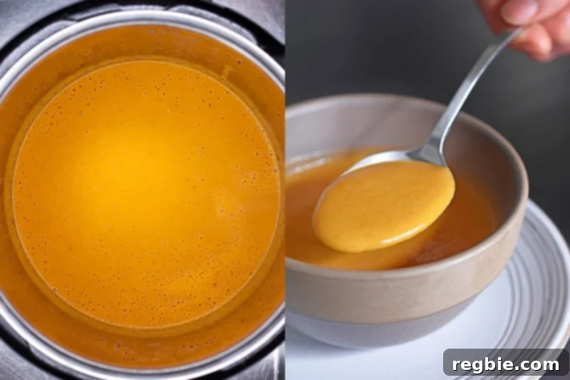 An overhead shot of bright orange duck gravy simmering in an open Instant Pot, ready to be served or stored.