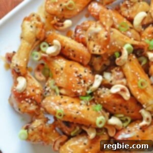 Juli Bauer's Sticky Sesame Teriyaki Chicken Wings by Michelle Tam https://nomnompaleo.com