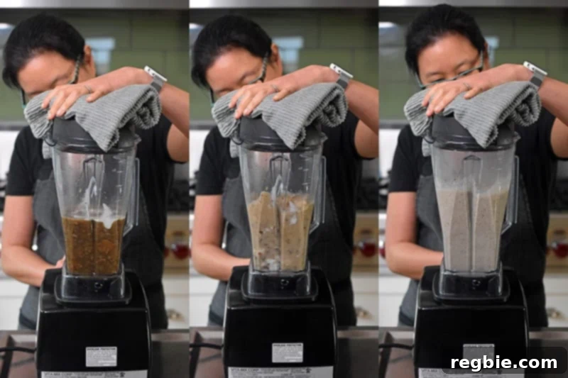 Blending the Instant Pot Cream of Mushroom Soup ingredients in a high speed blender.