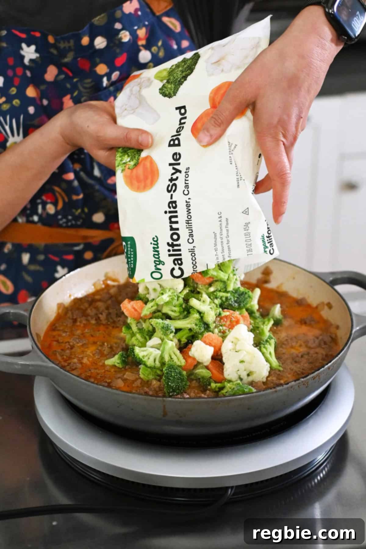 One-Pan Ground Beef and Veggie Power Bowl 12 Adding frozen vegetables