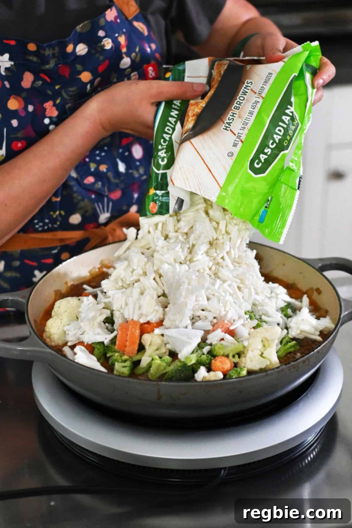 One-Pan Ground Beef and Veggie Power Bowl 13 Adding frozen hash browns