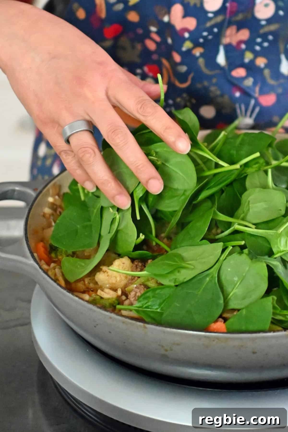 One-Pan Ground Beef and Veggie Power Bowl 18 Adding spinach