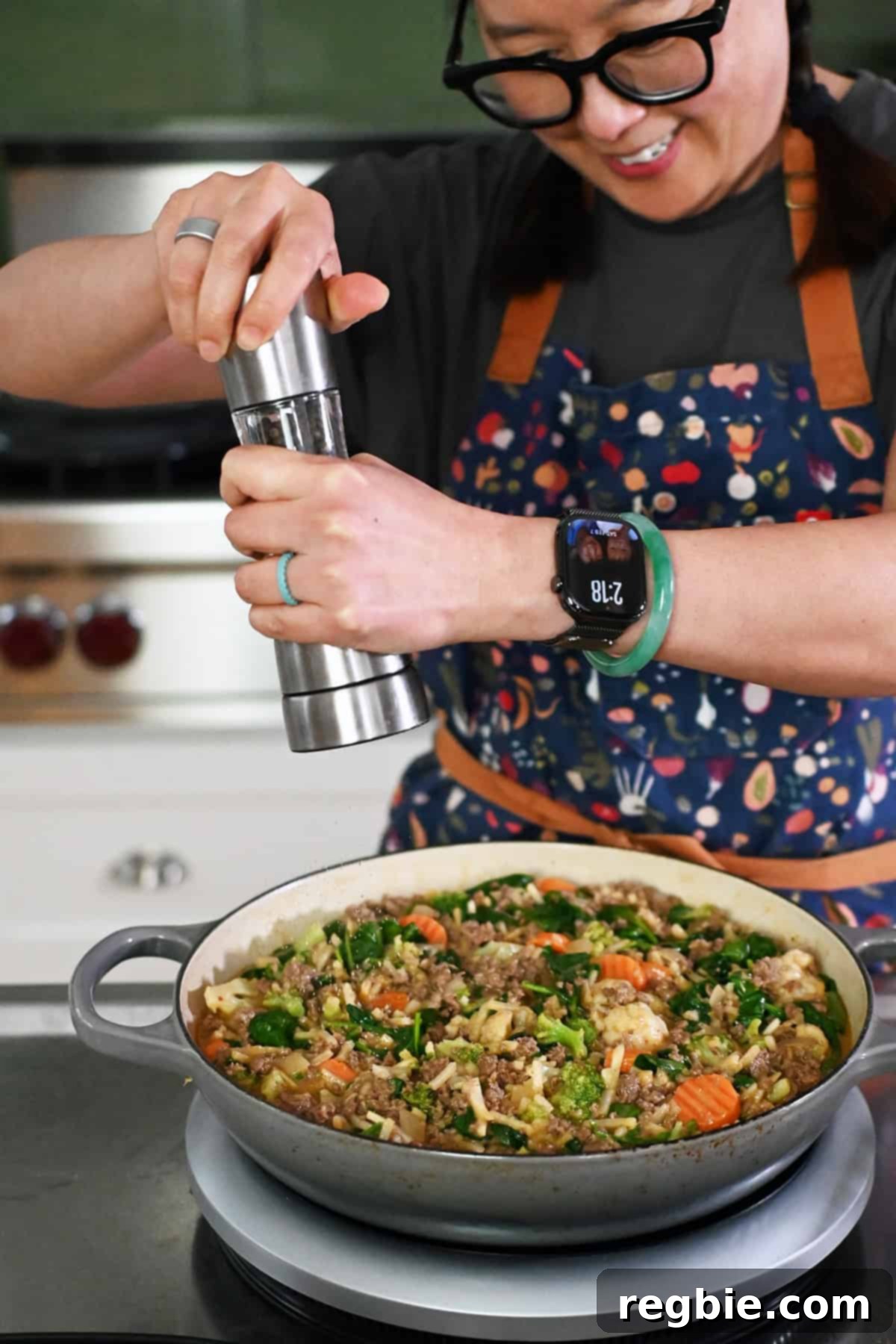 One-Pan Ground Beef and Veggie Power Bowl 20 Adding pepper