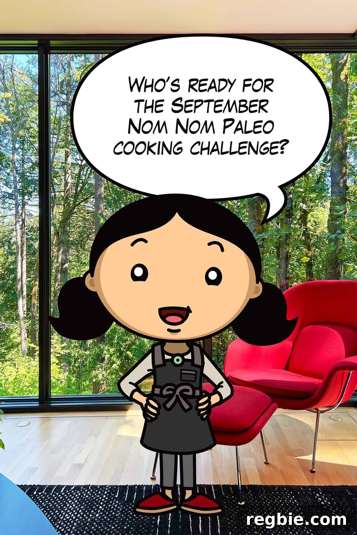A cartoon Michelle Tam is announcing the September Nom Nom Paleo Cooking Challenge in front of a red womb chair and large windows overlooking the forest.